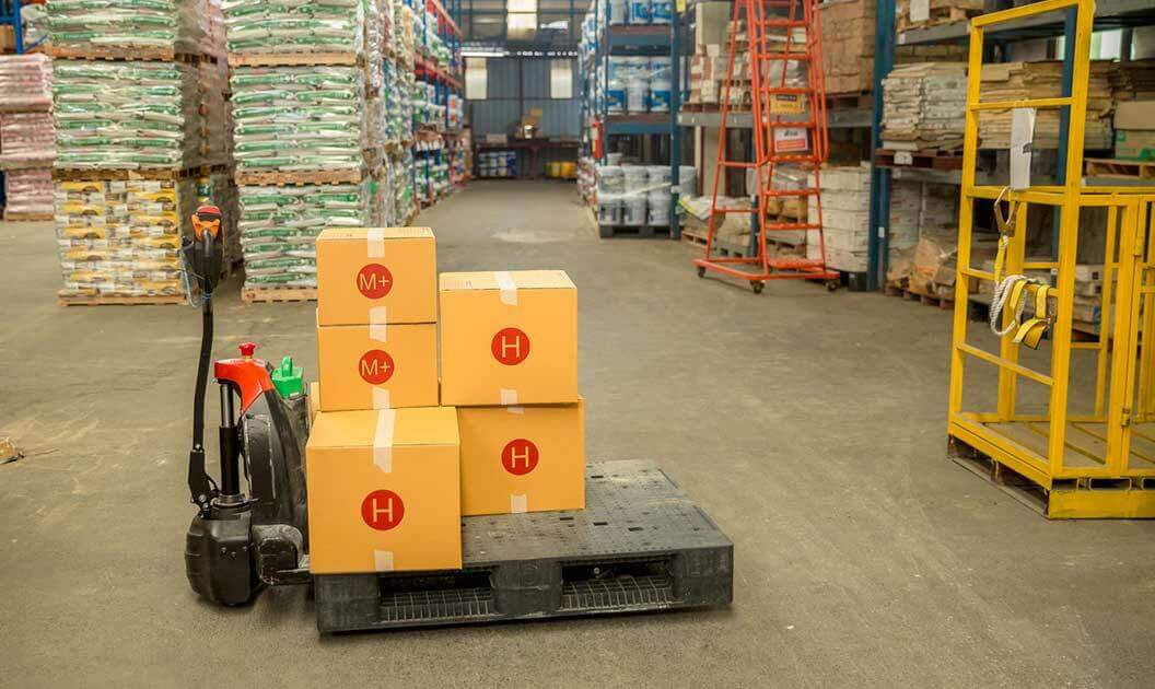 Boxes on a pallet that are attached to a pallet jack